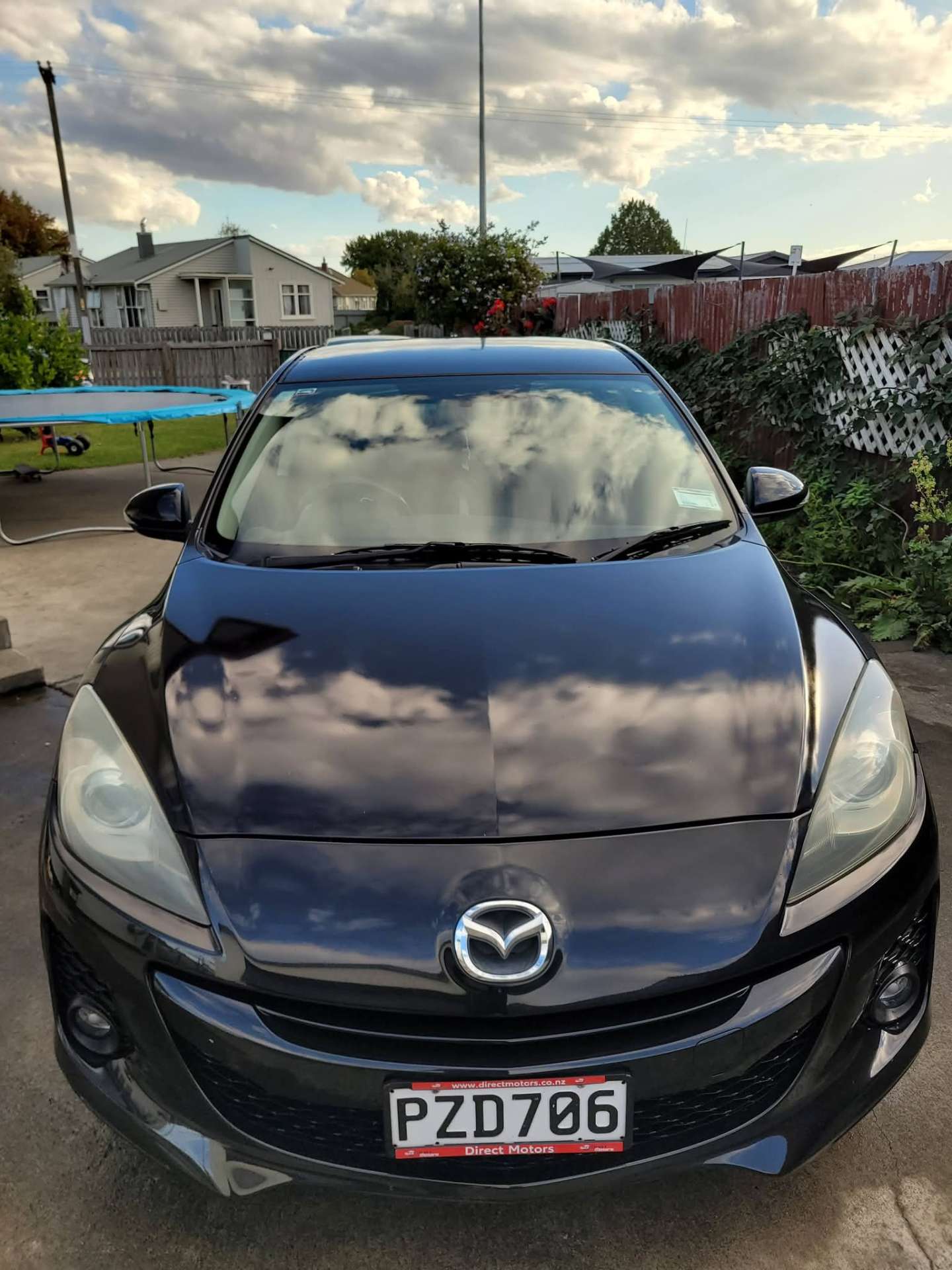 Black Hyundai side profile showing a glossy exterior detail finish